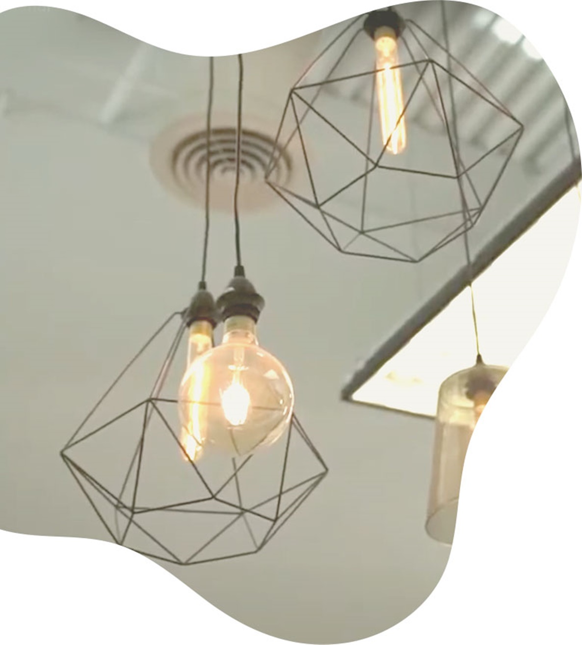 geometric wire chandelier and light bulbs